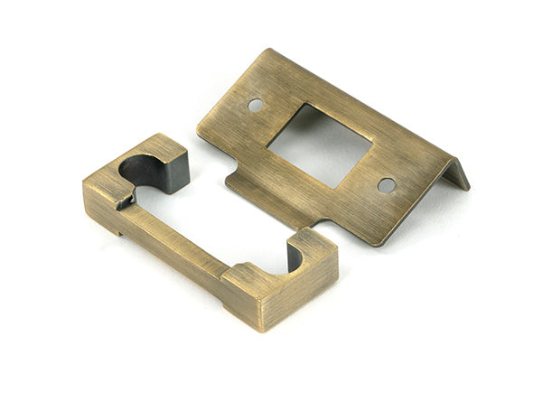 This is an image of From The Anvil - Aged Brass ½" Rebate Kit for Heavy Duty Latch available to order from T.H. Wiggans Ironmongery in Kendal.