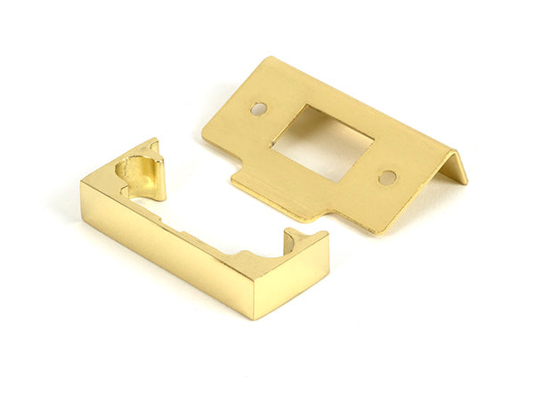 This is an image of From The Anvil - Polished Brass ½" Rebate Kit for Tubular Mortice Latch available to order from T.H. Wiggans Ironmongery in Kendal.