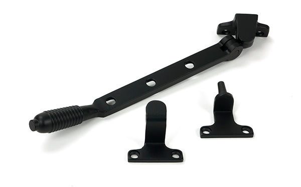 This is an image of From The Anvil - Matt Black 8" Reeded Stay (Steel Window) available to order from T.H. Wiggans Ironmongery in Kendal.