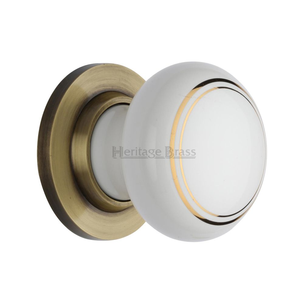 This is an image of a Heritage Brass - Gold Line Knob with Antique Brass base, 6010-at that is available to order from T.H Wiggans Ironmongery in Kendal.