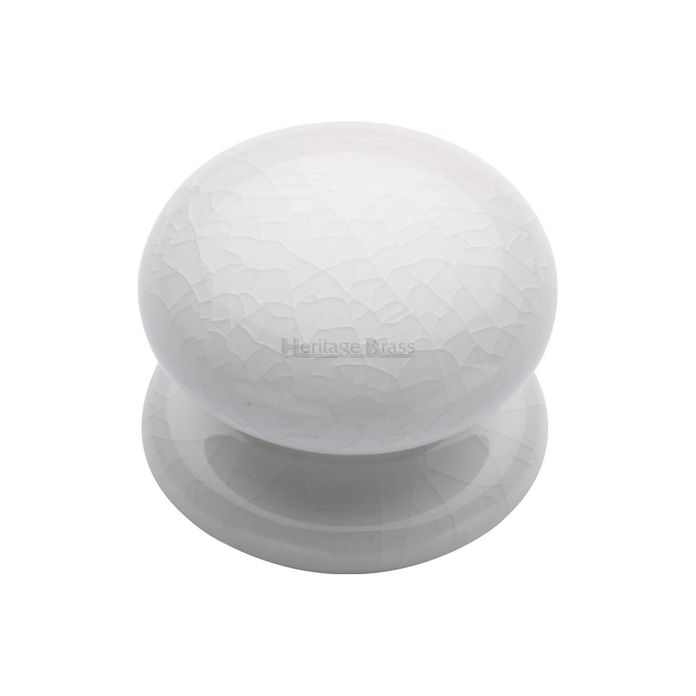 This is an image of a Heritage Brass - Cabinet Knob White Crackle 38mm with Porcelain base, 7038 that is available to order from T.H Wiggans Ironmongery in Kendal.