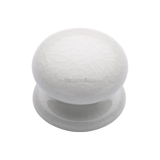 This is an image of a Heritage Brass - Cabinet Knob White Crackle 38mm with Porcelain base, 7038 that is available to order from T.H Wiggans Ironmongery in Kendal.