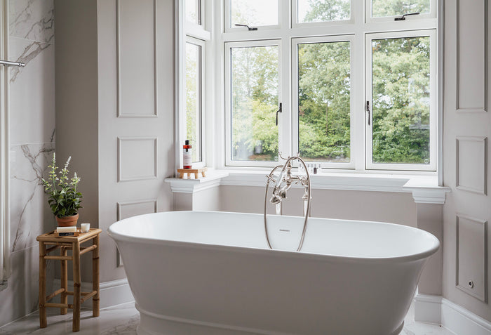 Image showing a free standing bathtub in the window wit From The Anvil window fittings.  Available to order from T>H Wiggans Ironmongery in Kendal