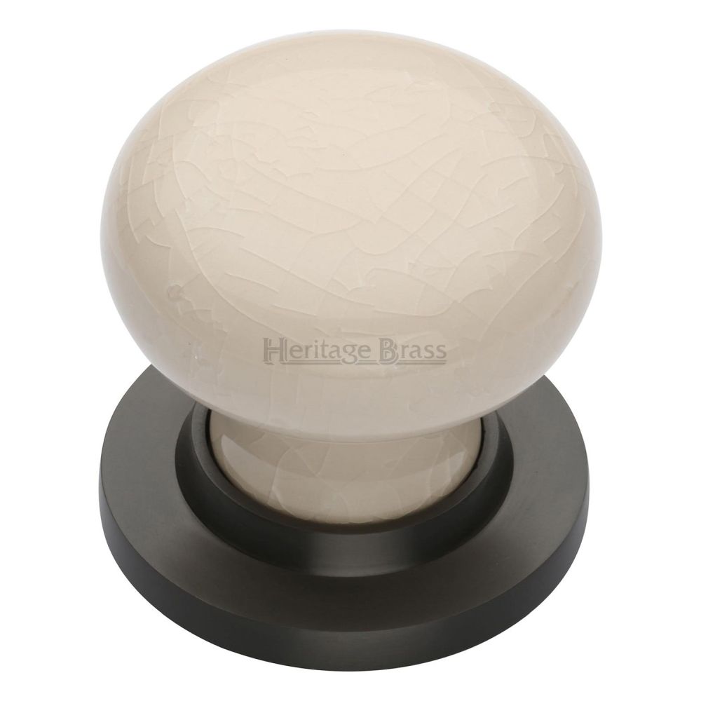 This is an image of a Heritage Brass - Cream Crackle Knob with Matt Bronze base, 8010-mb that is available to order from T.H Wiggans Ironmongery in Kendal.