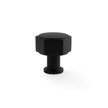This is an image showing Alexander & Wilks - Vesper Hex Cabinet Knob - Black aw828-33-bl available to order from T.H. Wiggans Ironmongery in Kendal, quick delivery and discounted prices.