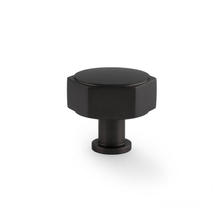 This is an image showing Alexander & Wilks - Vesper Hex Cabinet Knob - Black aw828-40-bl available to order from T.H. Wiggans Ironmongery in Kendal, quick delivery and discounted prices.