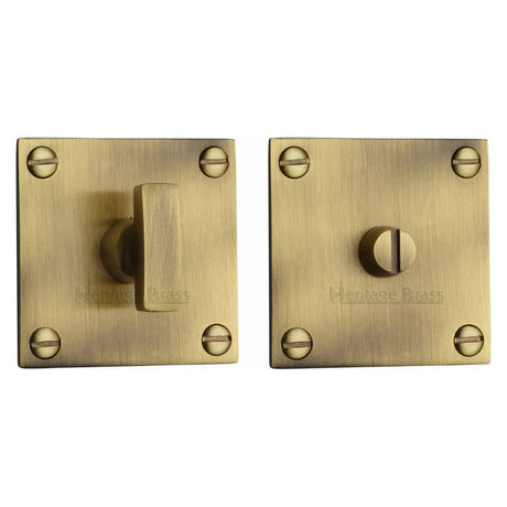 This is an image of a Heritage Brass - Square Low profile Thumbturn & Emergency Release Antique Brass Fin, bau1555-at that is available to order from T.H Wiggans Ironmongery in Kendal.