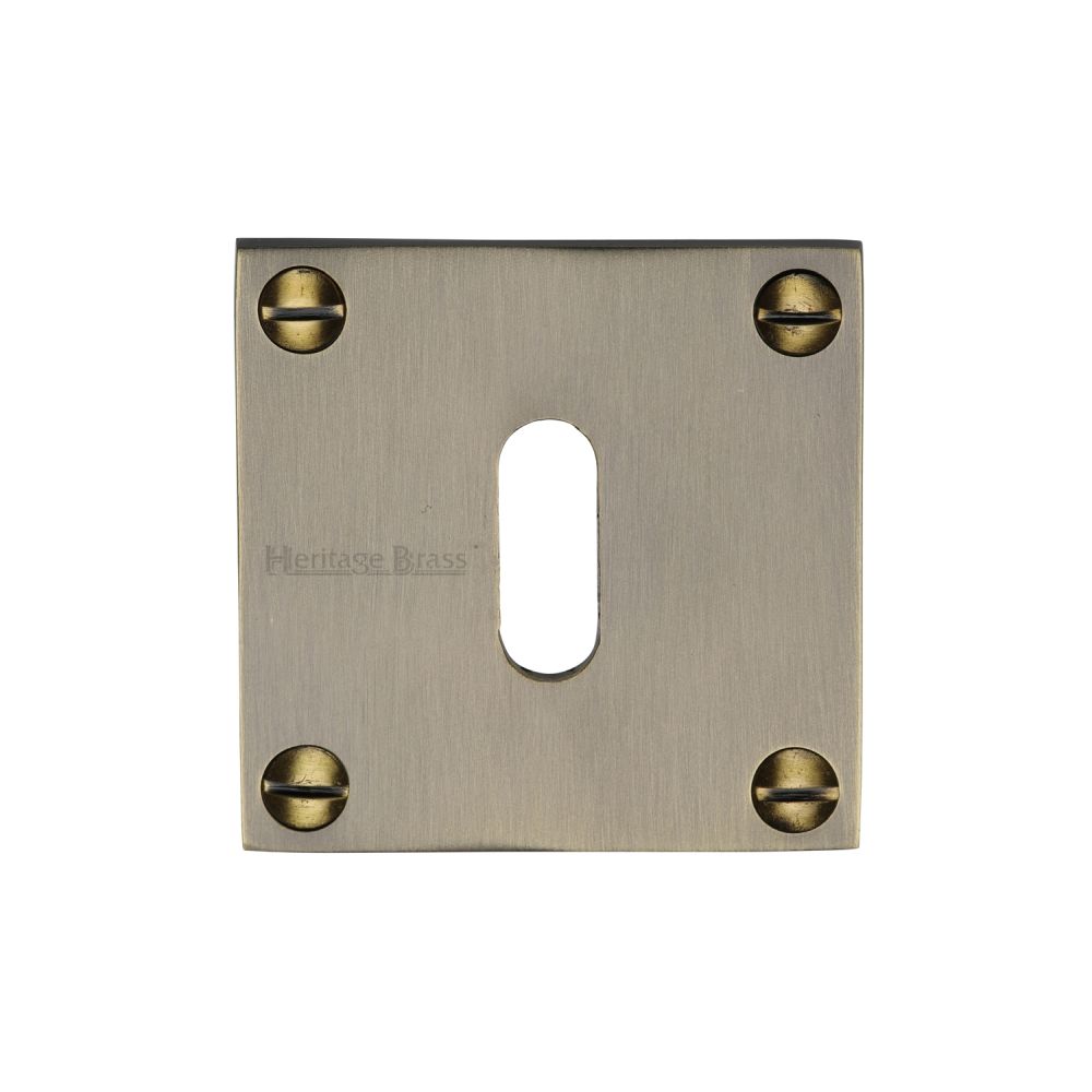 This is an image of a Heritage Brass - Keyhole Escutcheon Antique Brass Finish, bau1556-at that is available to order from T.H Wiggans Ironmongery in Kendal.
