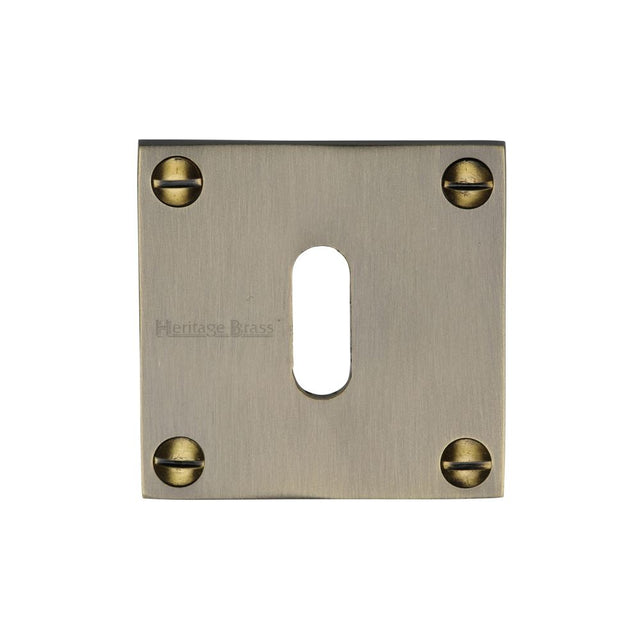 This is an image of a Heritage Brass - Keyhole Escutcheon Antique Brass Finish, bau1556-at that is available to order from T.H Wiggans Ironmongery in Kendal.