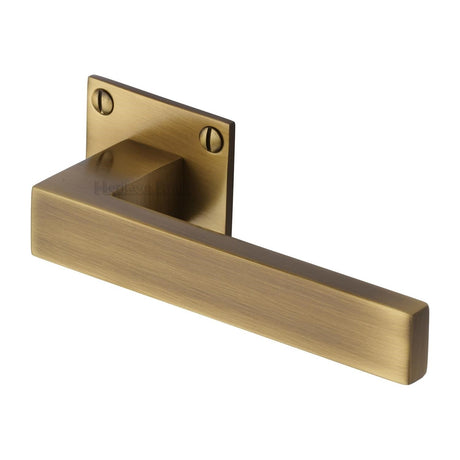 This is an image of a Heritage Brass - Door Handle Lever Latch on Square Rose Delta BH Design Antique finish, bau1928-at that is available to order from T.H Wiggans Ironmongery in Kendal.