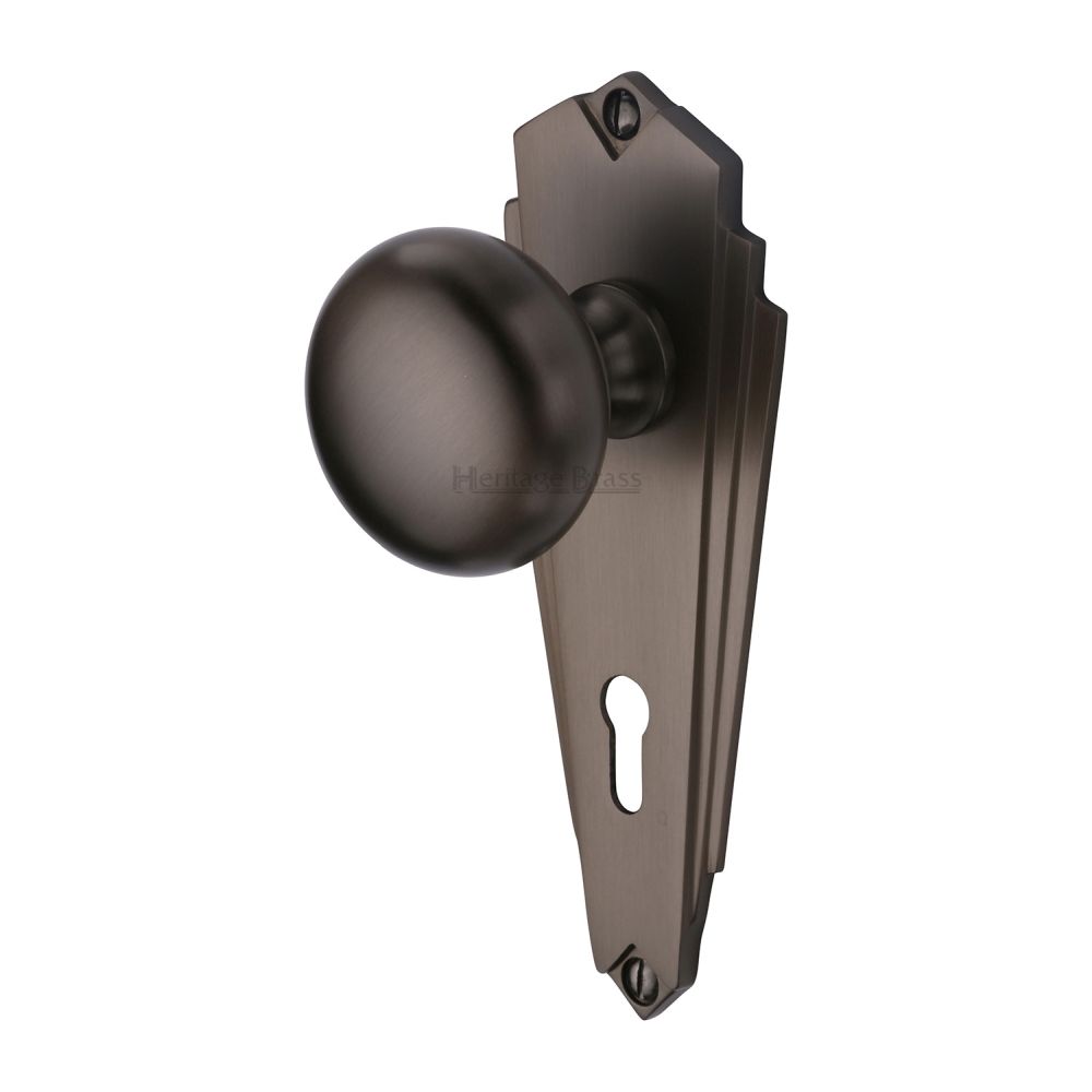 This is an image of a Heritage Brass - Mortice Knob on Lock Plate Broadway Design Matt Bronze Finish, br1800-mb that is available to order from T.H Wiggans Ironmongery in Kendal.