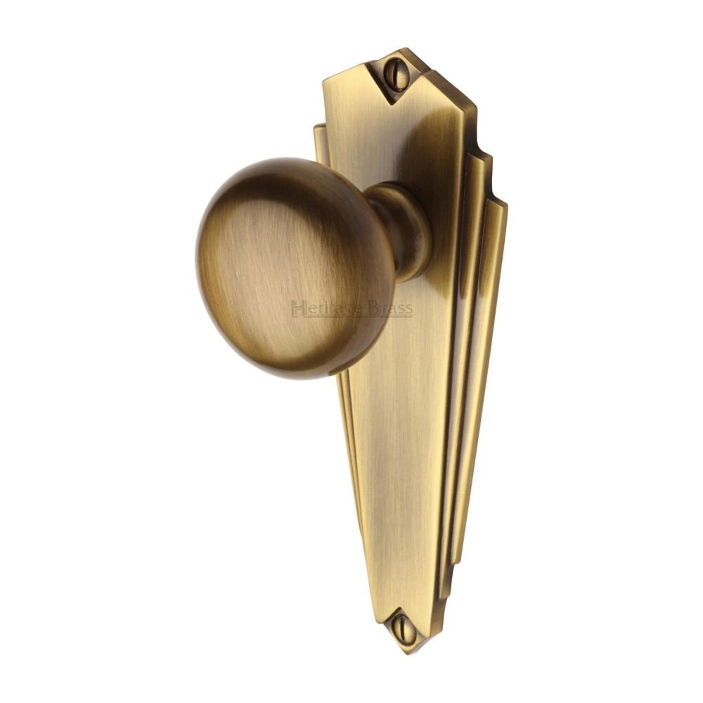 This is an image of a Heritage Brass - Mortice Knob on Latch Plate Broadway Design Antique Brass Finish, br1810-at that is available to order from T.H Wiggans Ironmongery in Kendal.