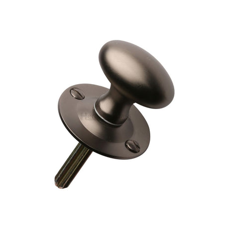 This is an image of a Heritage Brass - Oval Thumbturn w/o Bolt Matt Bronze Finish, bt5-mb that is available to order from T.H Wiggans Ironmongery in Kendal.