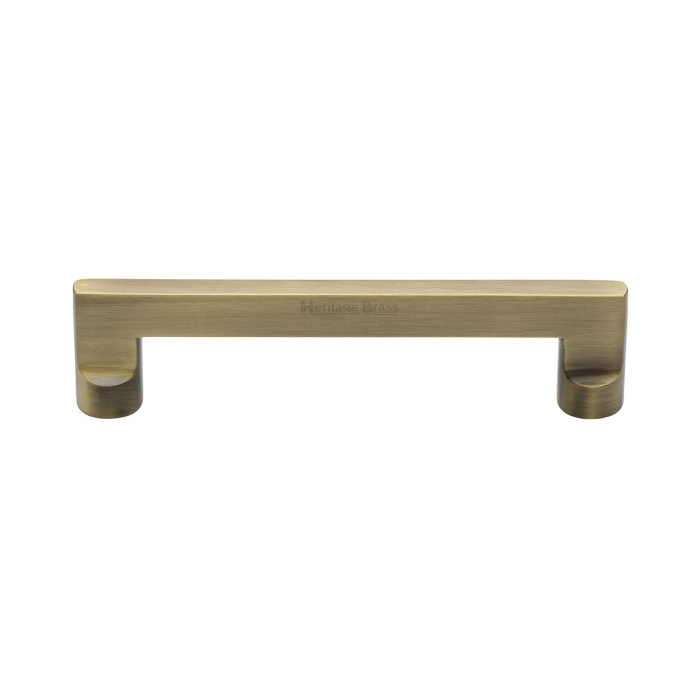 This is an image of a Heritage Brass - Cabinet Pull Apollo Design 128mm CTC Antique Brass Finish, c0345-128-at that is available to order from T.H Wiggans Ironmongery in Kendal.