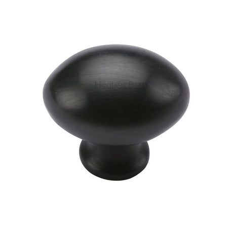 This is an image of a Heritage Brass - Cabinet Knob Victorian Oval Design 32mm Matt Black Finish, c114-32-bkmt that is available to order from T.H Wiggans Ironmongery in Kendal.