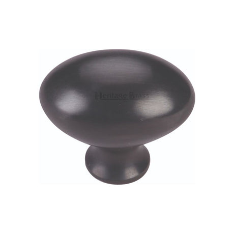This is an image of a Heritage Brass - Cabinet Knob Victorian Oval Design 38mm Matt Black Finish, c114-38-bkmt that is available to order from T.H Wiggans Ironmongery in Kendal.