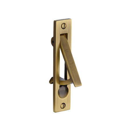 This is an image of a Heritage Brass - Pocket Door Edge Pull Antique Brass Finish, c1165-at that is available to order from T.H Wiggans Ironmongery in Kendal.
