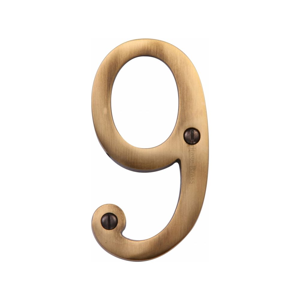 This is an image of a Heritage Brass - Numeral 9 Face Fix 76mm (3") Antique Brass Finish, c1560-9-at that is available to order from T.H Wiggans Ironmongery in Kendal.