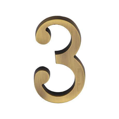 This is an image of a Heritage Brass - Numeral 3 Concealed Fix 76mm (3") Antique Brass finish, c1564-3-at that is available to order from T.H Wiggans Ironmongery in Kendal.