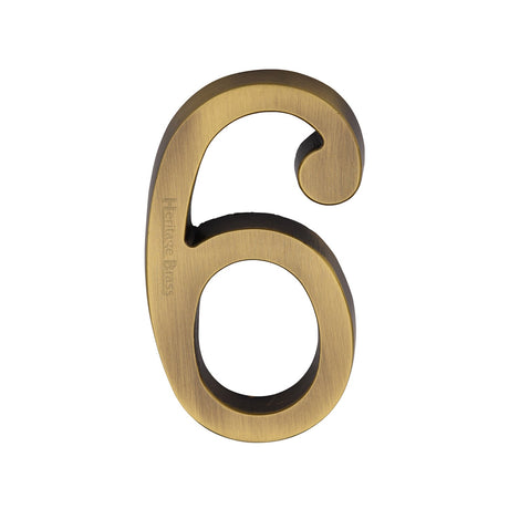 This is an image of a Heritage Brass - Numeral 6 Concealed Fix 76mm (3") Antique Brass finish, c1564-6-at that is available to order from T.H Wiggans Ironmongery in Kendal.