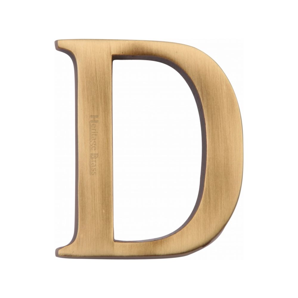 This is an image of a Heritage Brass - Alphabet D Pin Fix 51mm (2") Antique Brass Finish, c1565-2-d-at that is available to order from T.H Wiggans Ironmongery in Kendal.