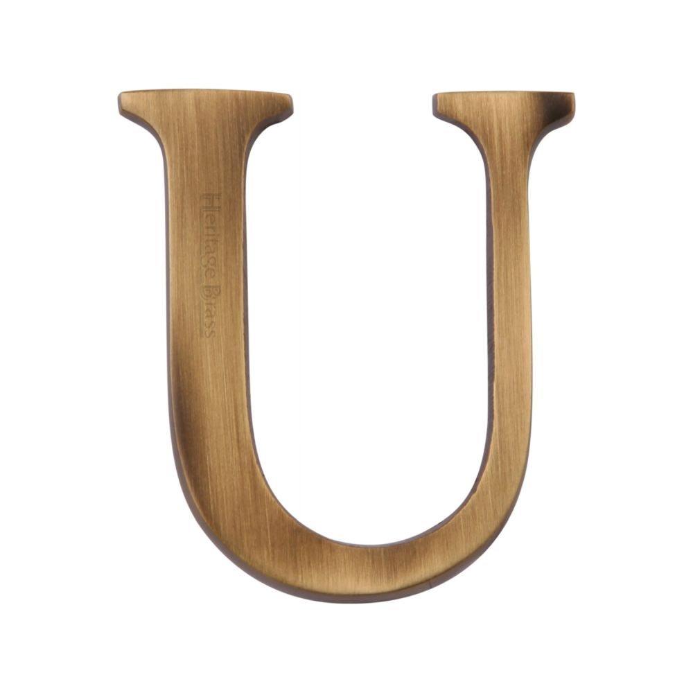 This is an image of a Heritage Brass - Alphabet U Pin Fix 51mm (2") Antique Brass Finish, c1565-2-u-at that is available to order from T.H Wiggans Ironmongery in Kendal.