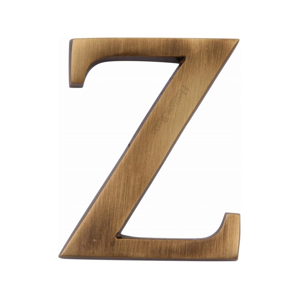 This is an image of a Heritage Brass - Alphabet Z Pin Fix 51mm (2") Antique Brass Finish, c1565-2-z-at that is available to order from T.H Wiggans Ironmongery in Kendal.