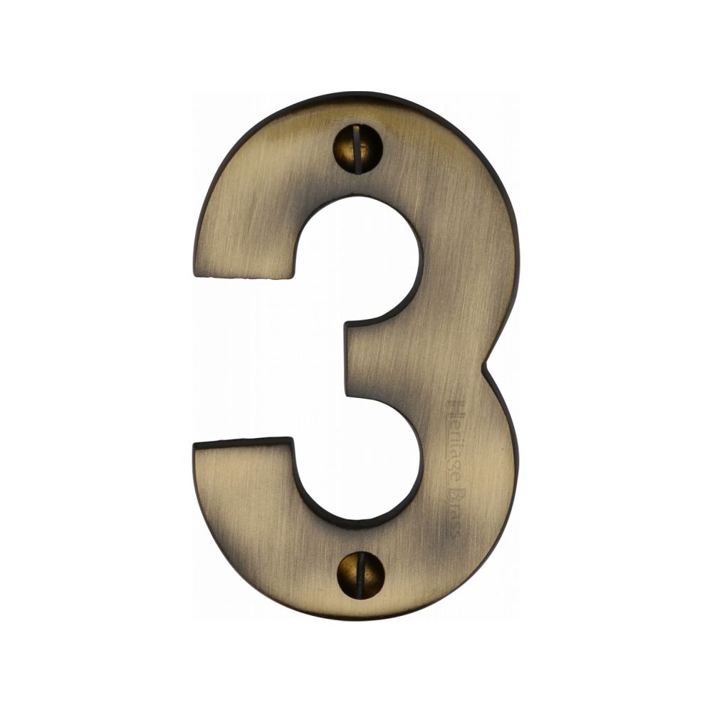 This is an image of a Heritage Brass - Numeral 3 Face Fix 76mm (3") Antique Brass Finish, c1566-3-at that is available to order from T.H Wiggans Ironmongery in Kendal.