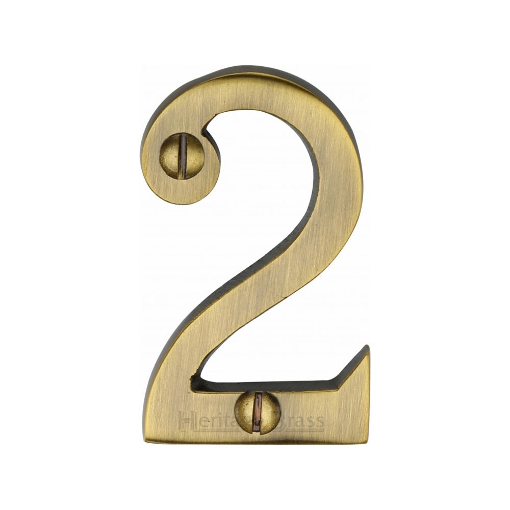 This is an image of a Heritage Brass - Numeral 2 Face Fix 51mm (2") Antique Brass Finish, c1567-2-at that is available to order from T.H Wiggans Ironmongery in Kendal.