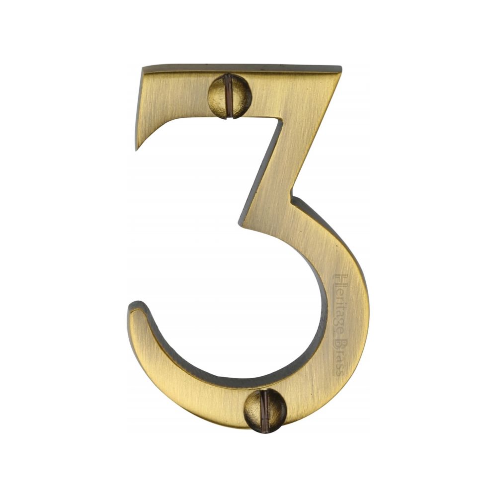 This is an image of a Heritage Brass - Numeral 3 Face Fix 51mm (2") Antique Brass Finish, c1567-3-at that is available to order from T.H Wiggans Ironmongery in Kendal.