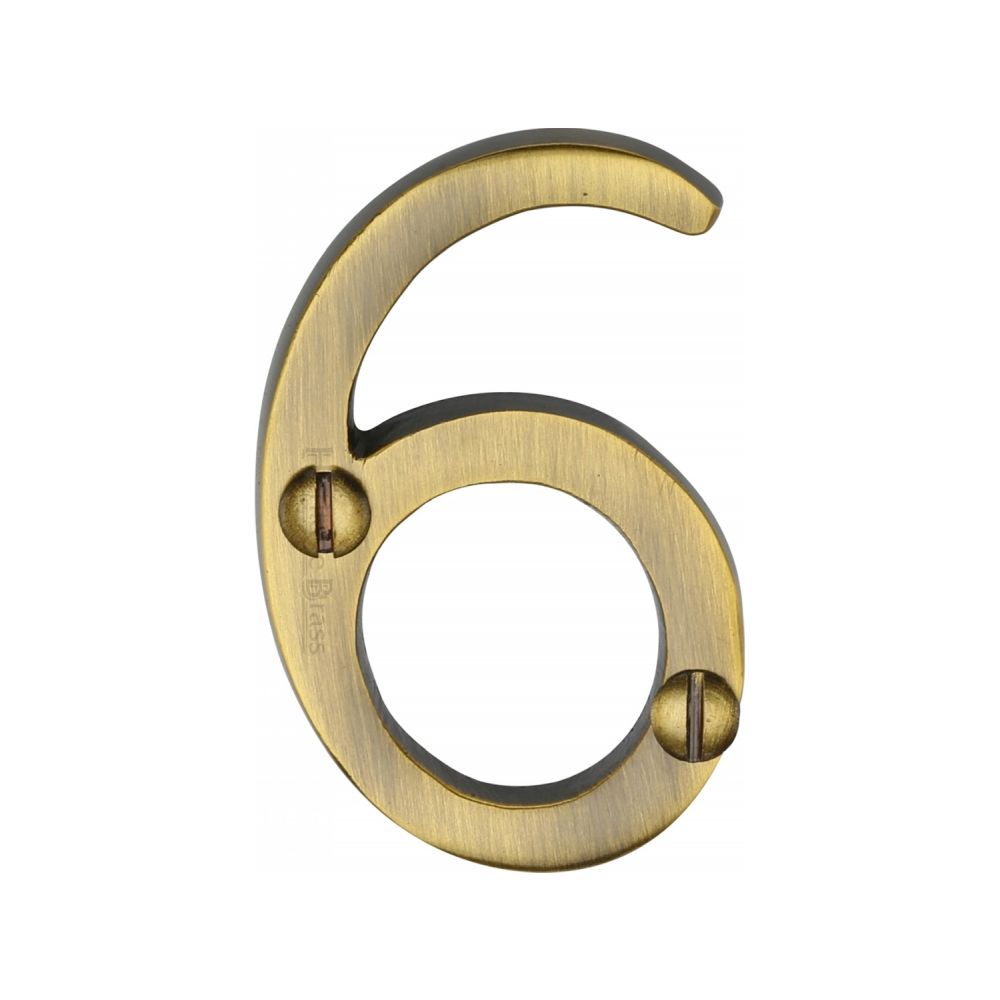 This is an image of a Heritage Brass - Numeral 6 Face Fix 51mm (2") Antique Brass Finish, c1567-6-at that is available to order from T.H Wiggans Ironmongery in Kendal.
