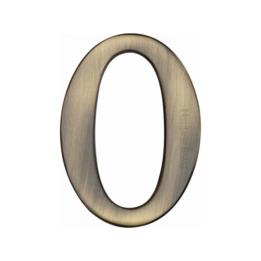 This is an image of a Heritage Brass - Numeral 0 Self Adhesive 51mm (2") Antique Brass Finish, c1568-0-at that is available to order from T.H Wiggans Ironmongery in Kendal.