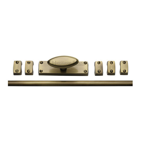 This is an image of a Heritage Brass - Espagnolette Bolt Antique Brass Finish, c1688-at that is available to order from T.H Wiggans Ironmongery in Kendal.