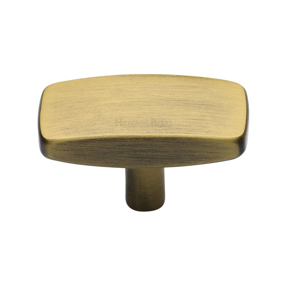 This is an image of a Heritage Brass - Cabinet Knob Rectangular Design 47mm Antique Brass Finish, c3384-47-at that is available to order from T.H Wiggans Ironmongery in Kendal.
