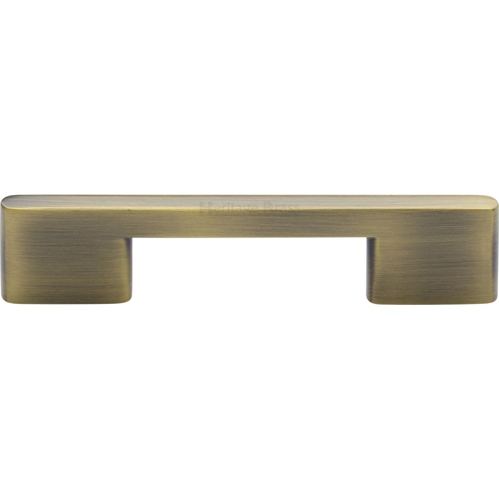 This is an image of a Heritage Brass - Cabinet Pull Slim Metro Design 96mm CTC Antique Brass Finish, c3681-96-at that is available to order from T.H Wiggans Ironmongery in Kendal.