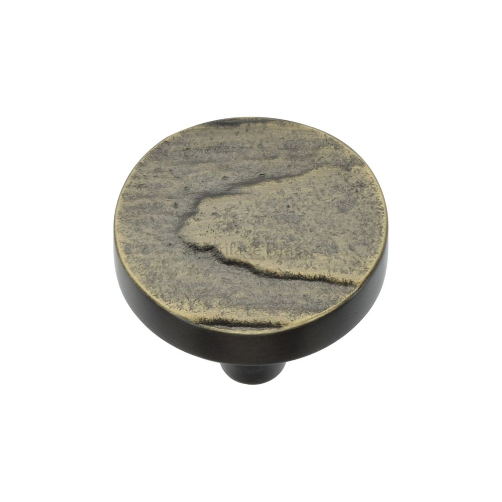 This is an image of a Heritage Brass - Cabinet Knob Round Pine Design 32mm Aged Brass Finish, c3697-32-ab that is available to order from T.H Wiggans Ironmongery in Kendal.