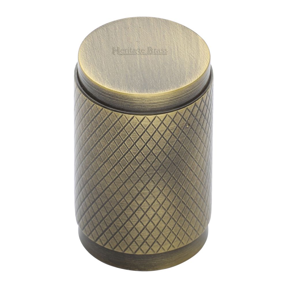 This is an image of a Heritage Brass - Cabinet Knob Cylindric Knurled Design 21mm Antique Brass Finish, c3840-at that is available to order from T.H Wiggans Ironmongery in Kendal.