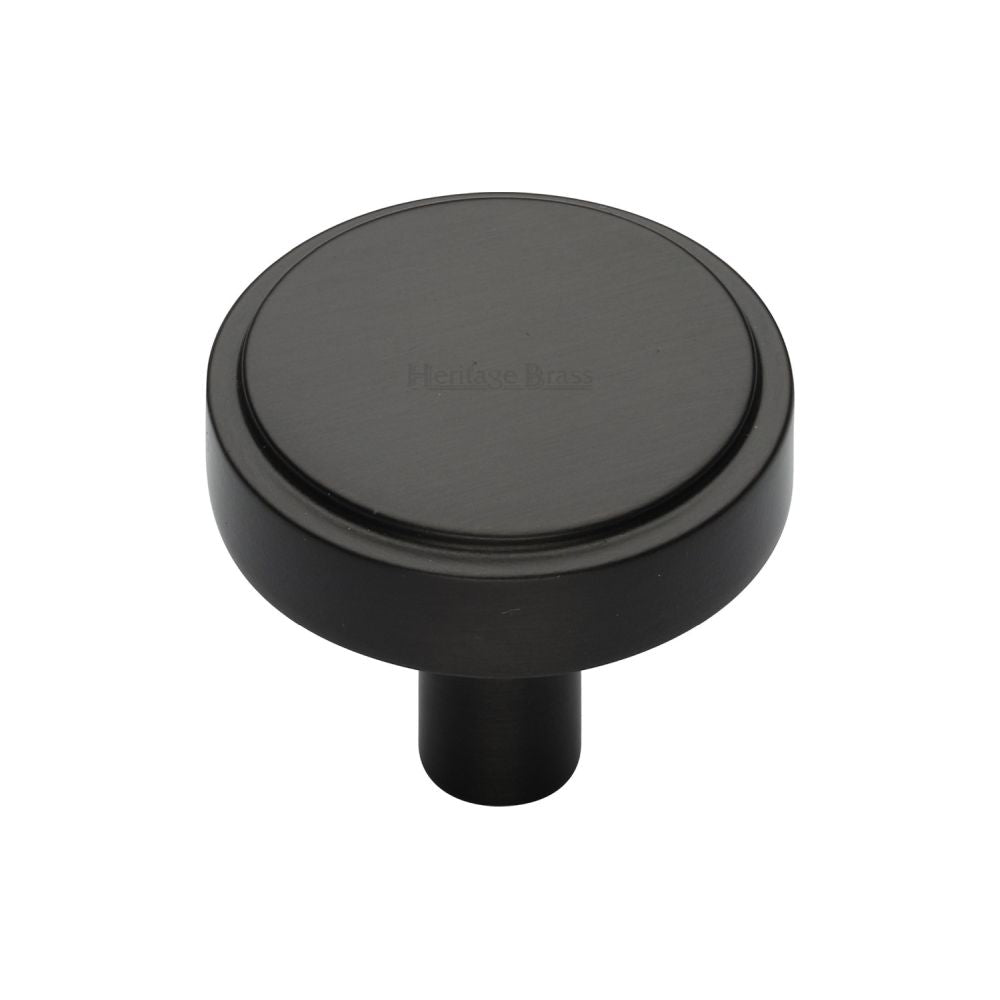 This is an image of a Heritage Brass - Cabinet Knob Stepped Disc Design 32mm Matt Bronze Finish, c3952-32-mb that is available to order from T.H Wiggans Ironmongery in Kendal.