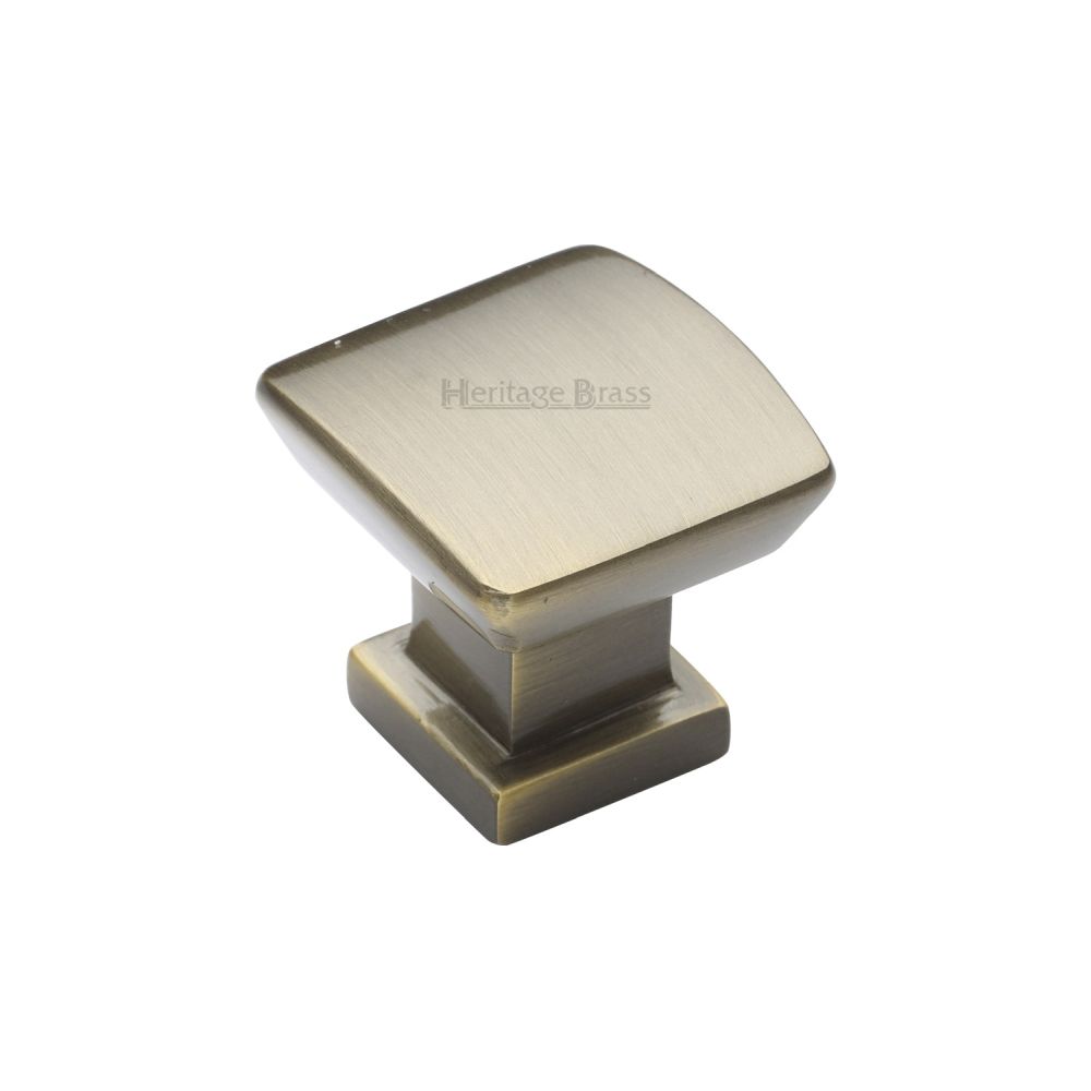 This is an image of a Heritage Brass - Cabinet Knob Plinth Square Design with base 25mm Antique Brass Fin, c4382-25-at that is available to order from T.H Wiggans Ironmongery in Kendal.