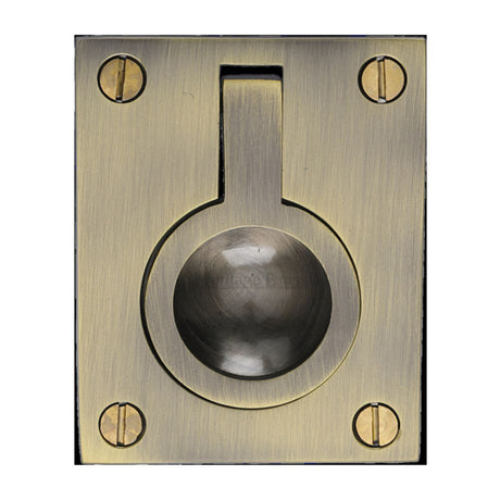 This is an image of a Heritage Brass - Cabinet Pull Flush Ring Design 50mm Antique Brass Finish, c6337-50-at that is available to order from T.H Wiggans Ironmongery in Kendal.
