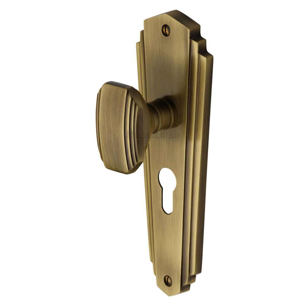 This is an image of a Heritage Brass - Mortice Knob on Euro Profile Plate Charlston Design Antique Brass, cha1948-at that is available to order from T.H Wiggans Ironmongery in Kendal.