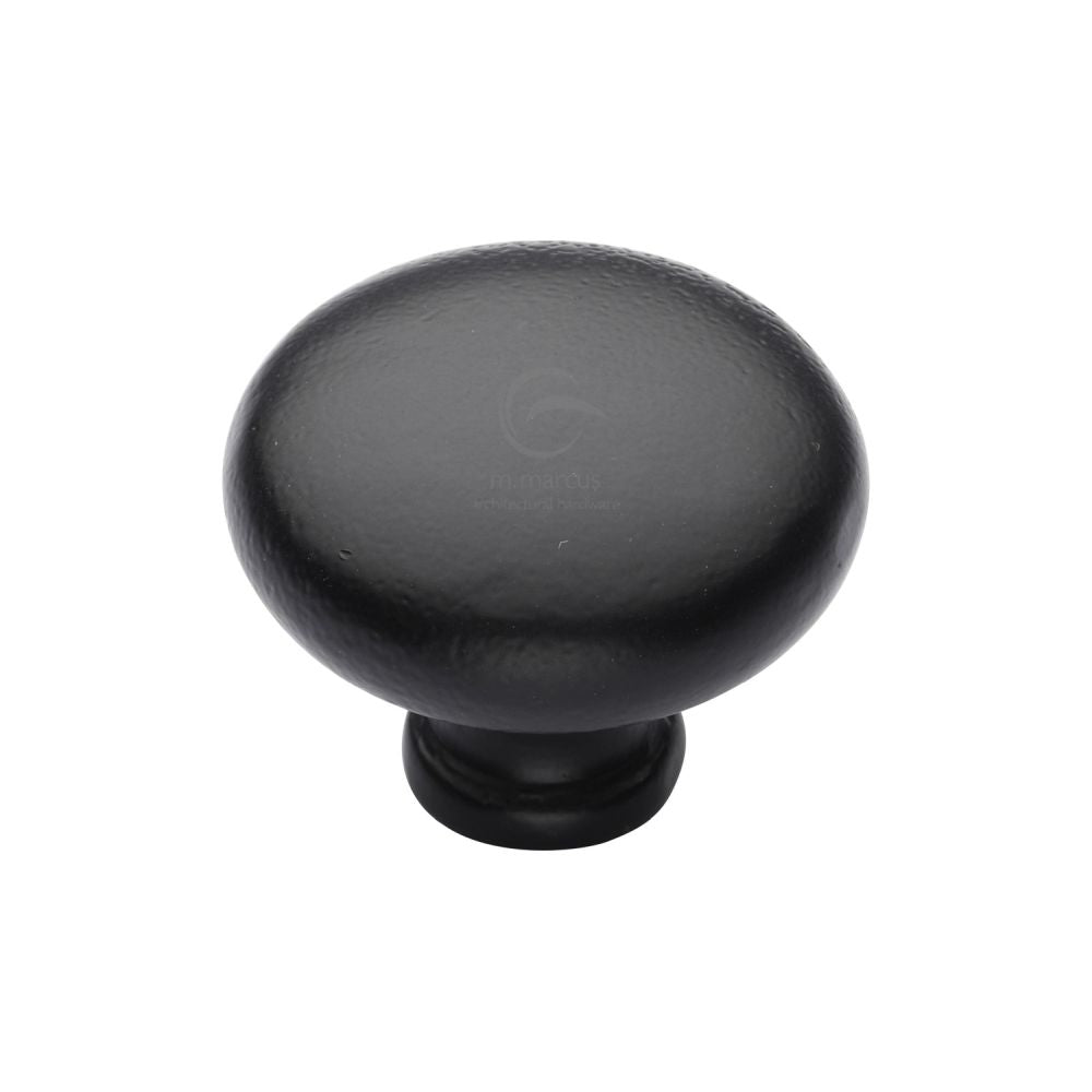 This is an image of a M.Marcus - Black Iron Rustic Cabinet Knob Round Design 32mm, fb117-32 that is available to order from T.H Wiggans Ironmongery in Kendal.