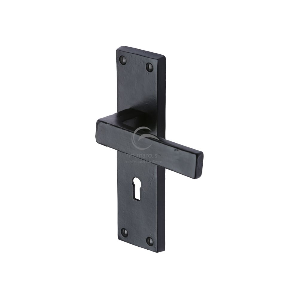 This is an image of a M.Marcus - Black Iron Rustic Door Handle Lever Lock Cheswell Design, fb3100 that is available to order from T.H Wiggans Ironmongery in Kendal.