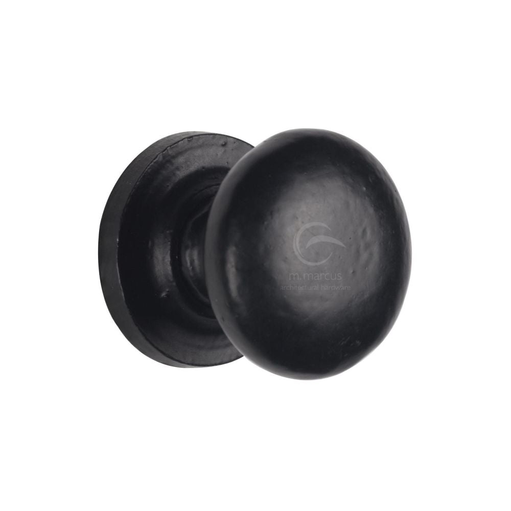 This is an image of a M.Marcus - Black Iron Rustic Cabinet Knob on Round Plate Round Design 32mm, fb613-32 that is available to order from T.H Wiggans Ironmongery in Kendal.