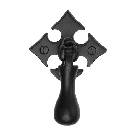 This is an image of a M.Marcus - Matt Black Rustic Iron Fleur-De-Lys Cabinet Drop Pull, fb6261 that is available to order from T.H Wiggans Ironmongery in Kendal.