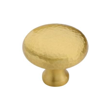 This is an image of a Heritage Brass - Cabinet Knob Victorian Round Hammered Design 38mm Satin Brass finish, ham113-38-sb that is available to order from T.H Wiggans Ironmongery in Kendal.