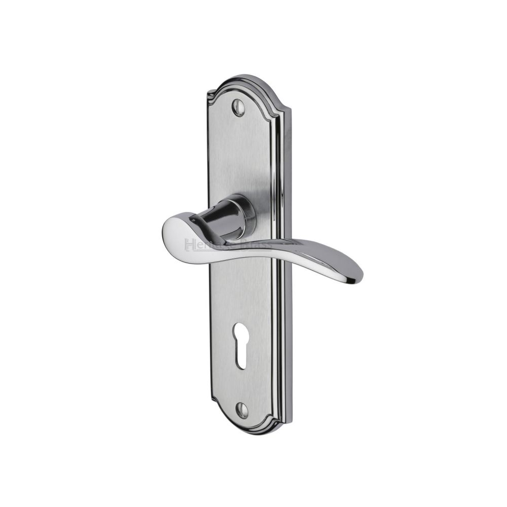 This is an image of a Heritage Brass - Door Handle Lever Lock Howard Design Apollo Finish, how1300-ap that is available to order from T.H Wiggans Ironmongery in Kendal.