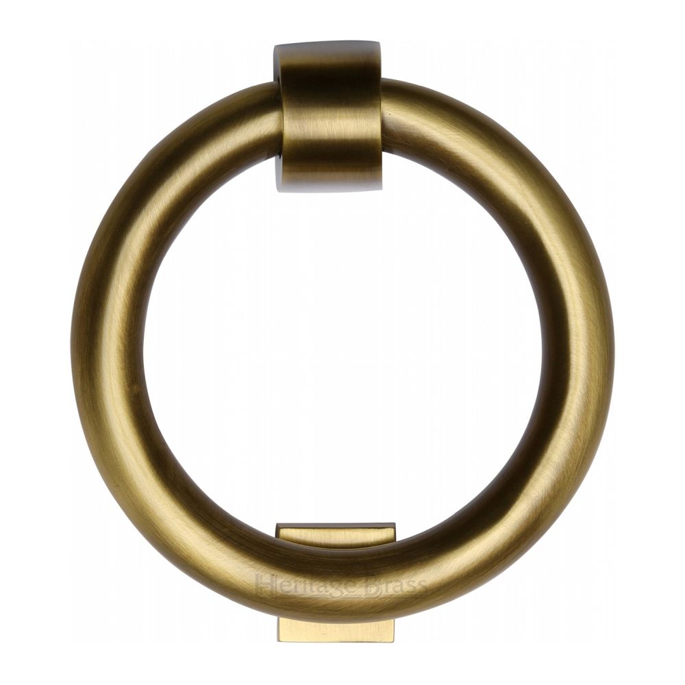 This is an image of a Heritage Brass - Ring Knocker Antique Brass Finish, k1270-at that is available to order from T.H Wiggans Ironmongery in Kendal.