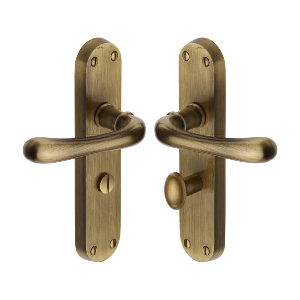 This is an image of a Heritage Brass - Door Handle for Bathroom Luna Design Antique Brass Finish, lun5330-at that is available to order from T.H Wiggans Ironmongery in Kendal.