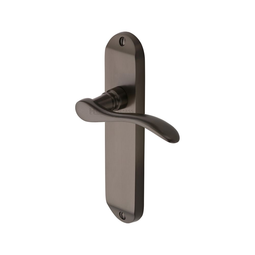 This is an image of a Heritage Brass - Door Handle Lever Latch Maya Design Matt Bronze Finish, may7610-mb that is available to order from T.H Wiggans Ironmongery in Kendal.